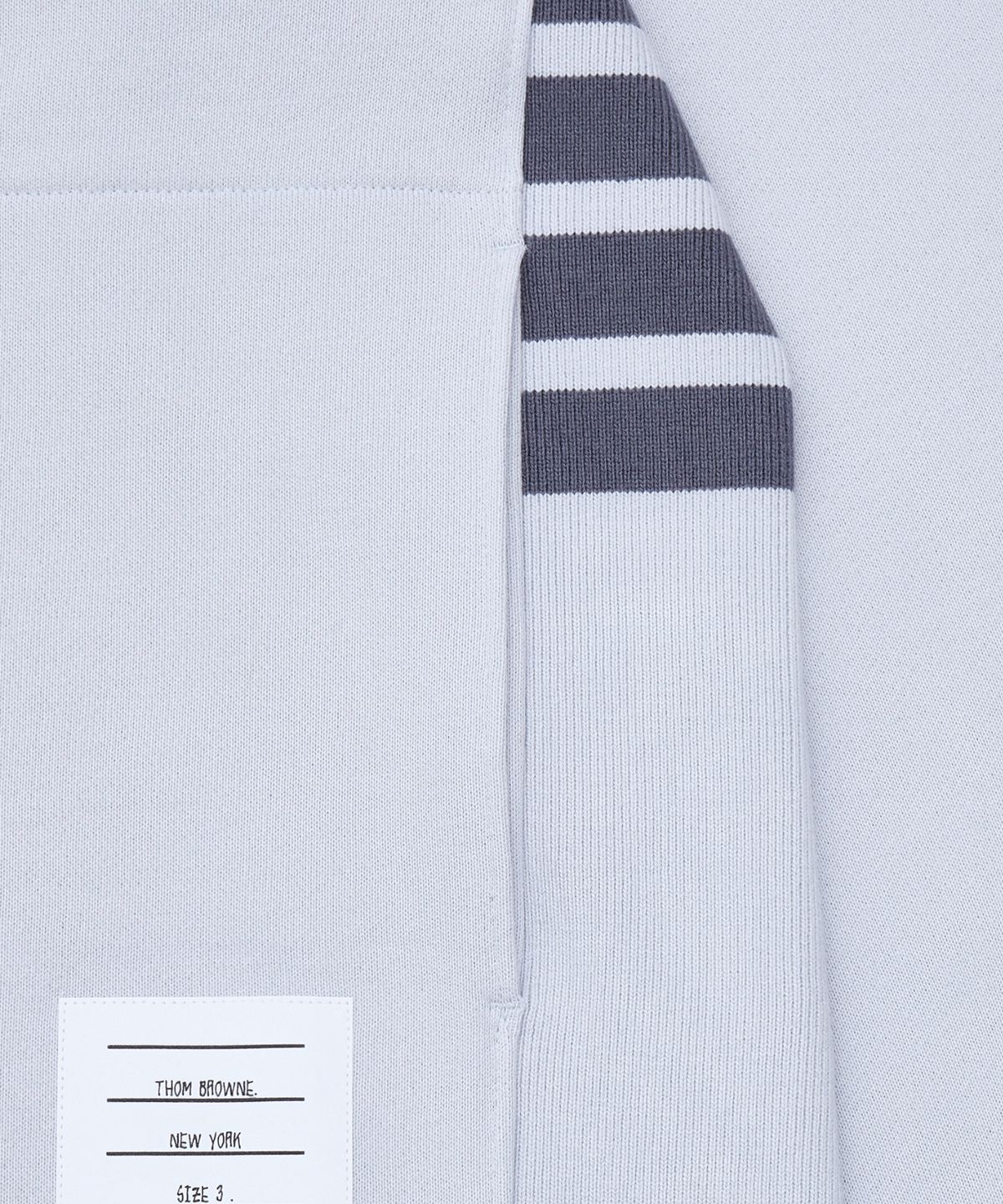 톰 브라운(THOM BROWNE) 루프백 저지 4-바 집업 후드 - 페일 그레이 / MJT517A03037050