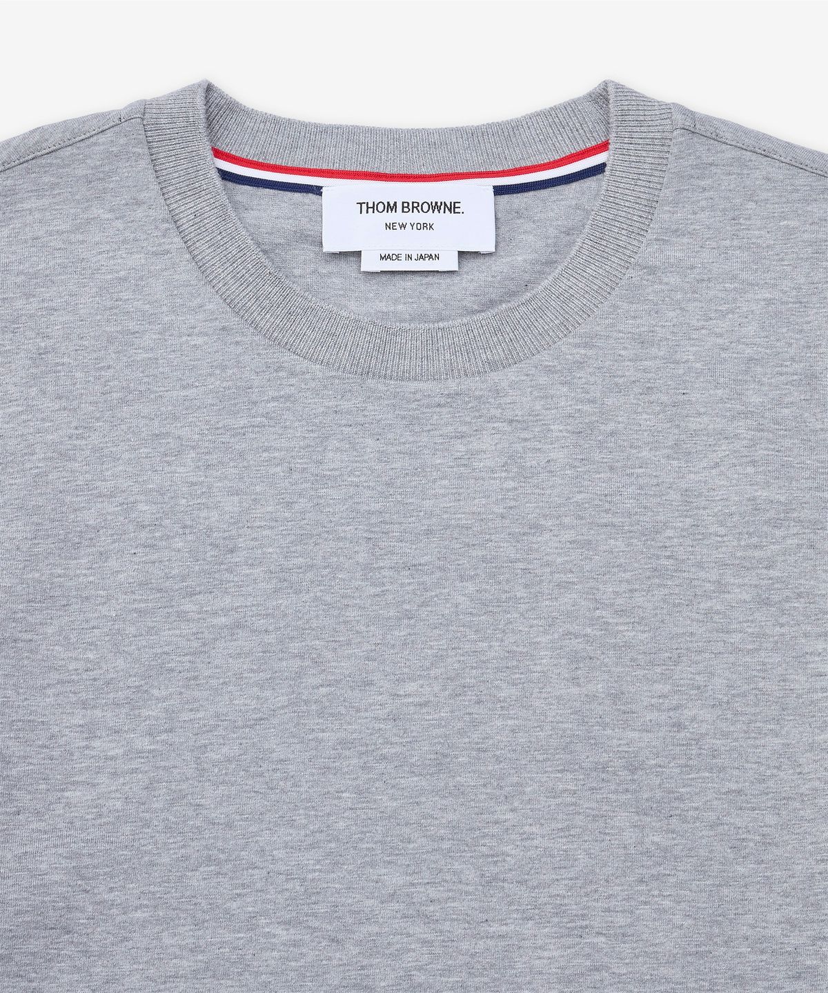톰 브라운(THOM BROWNE) 오버사이즈 롱 슬리브 RWB 트림 티셔츠 - 라이트 그레이 / MJS289A00042055