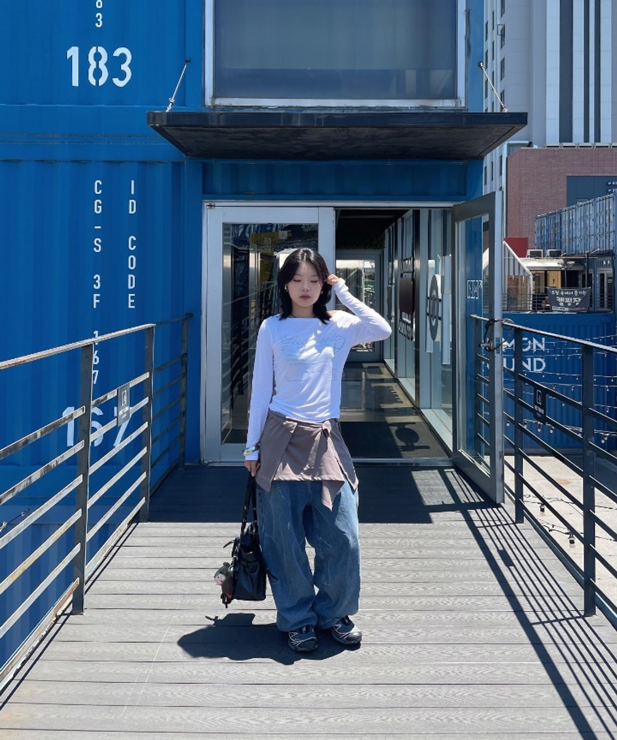 지제뮤지엄(ZIZEMUSEUM) LAYERED SNAP WRAP SKIRT (TAUPE GRAY)