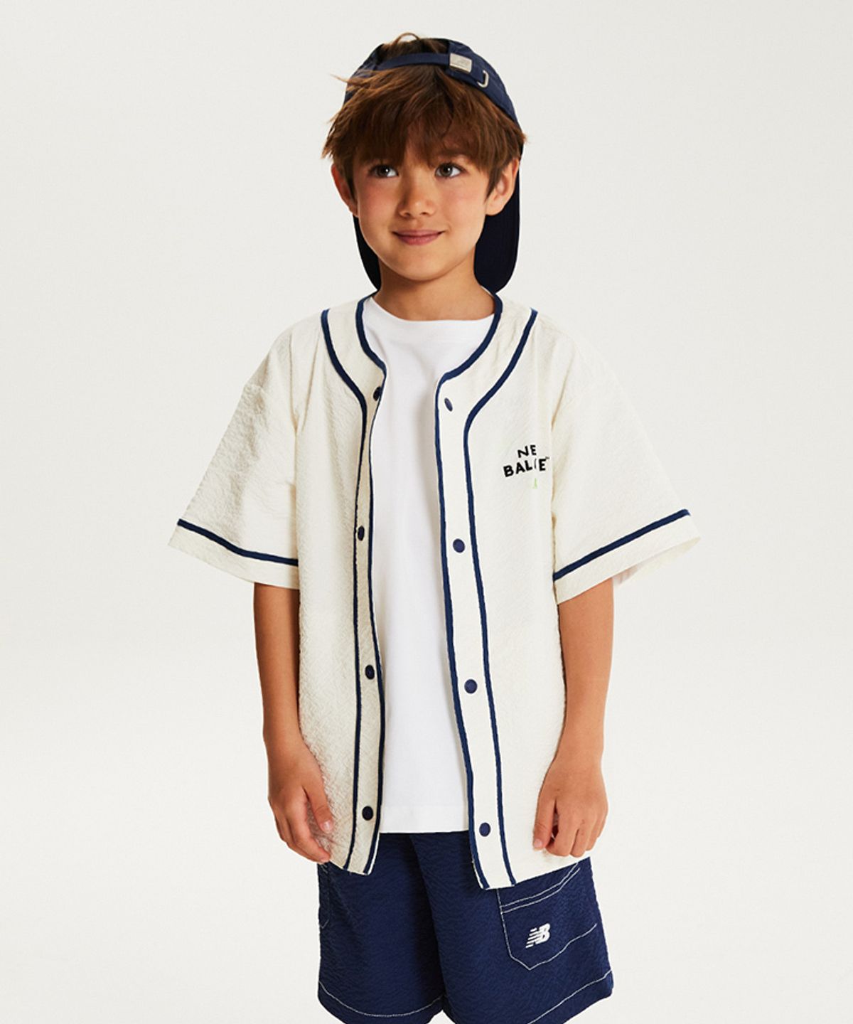 뉴발란스 키즈(NEWBALANCEKIDS) Run Festival_아동 시어서커  V셔켓 셋업 NK9YG2503U39