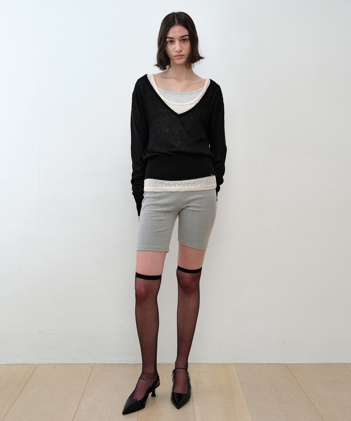 시메트릭 퍼센트(SYMMETRICPERCENT) Deep V-neck Sheer Knit Top / Black