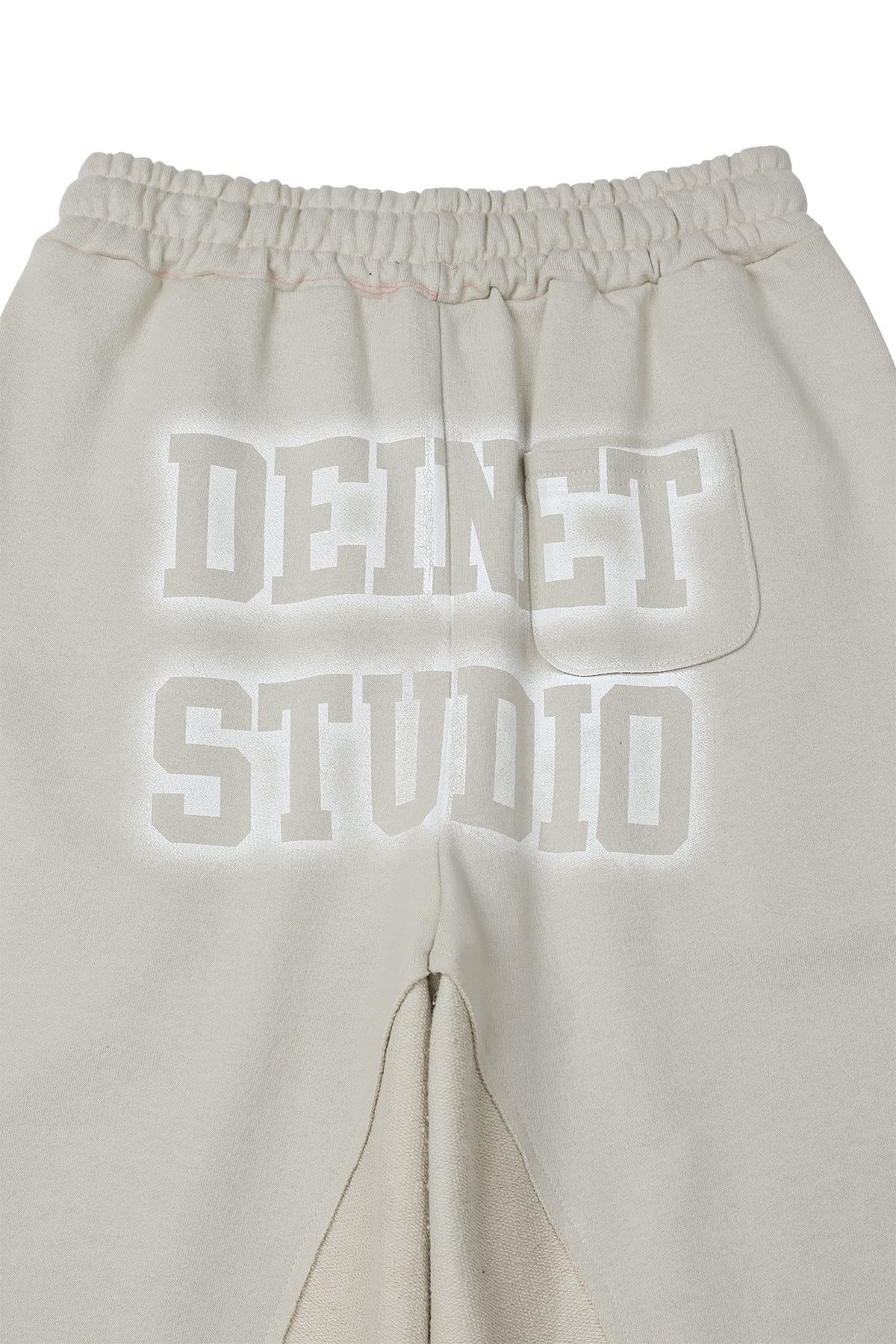 다이닛(DEINET) REVERSE CUT SWEATPANTS IN BEIGE