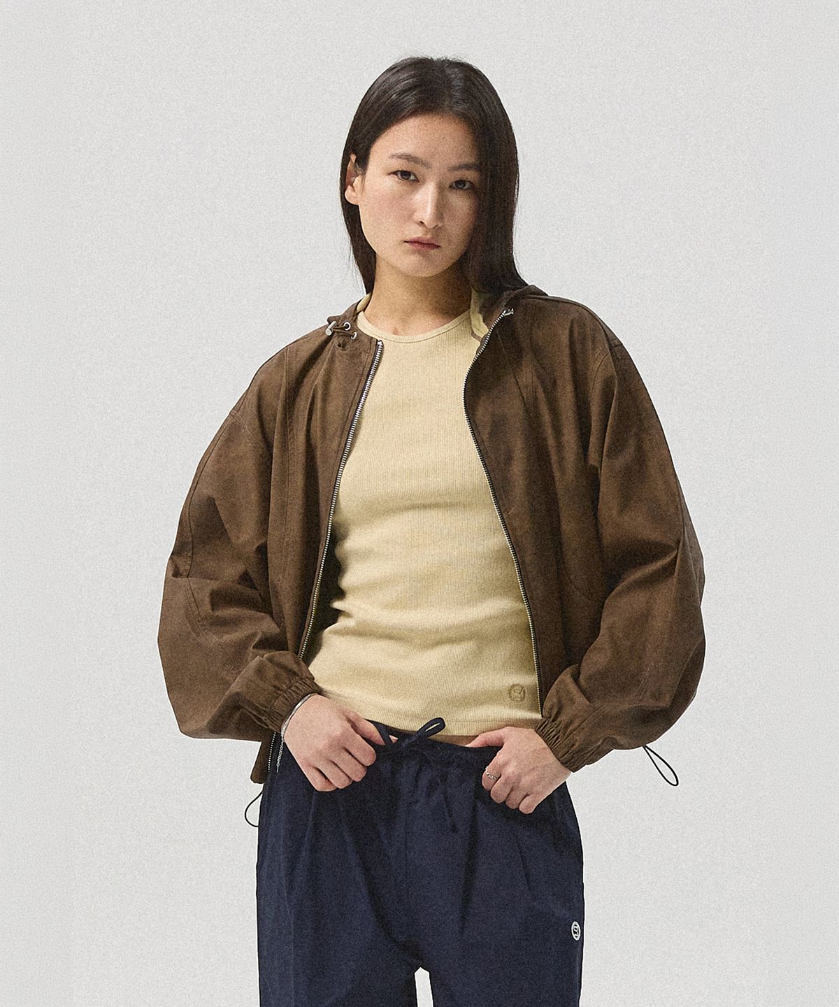 아흐레(AHRE) Kael Crack Faux Leather Hood Wind Jacket_BROWN