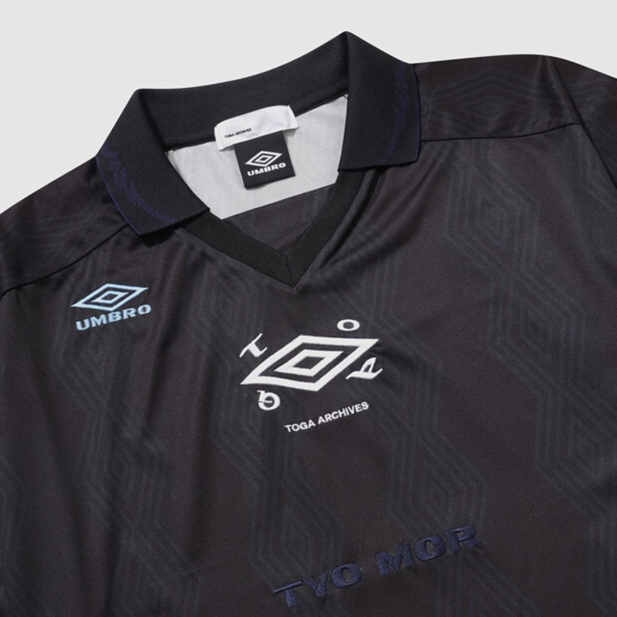 엄브로(UMBRO) [UMB X TOGA] 반팔 게임 셔츠 블랙 UR111ORJ21