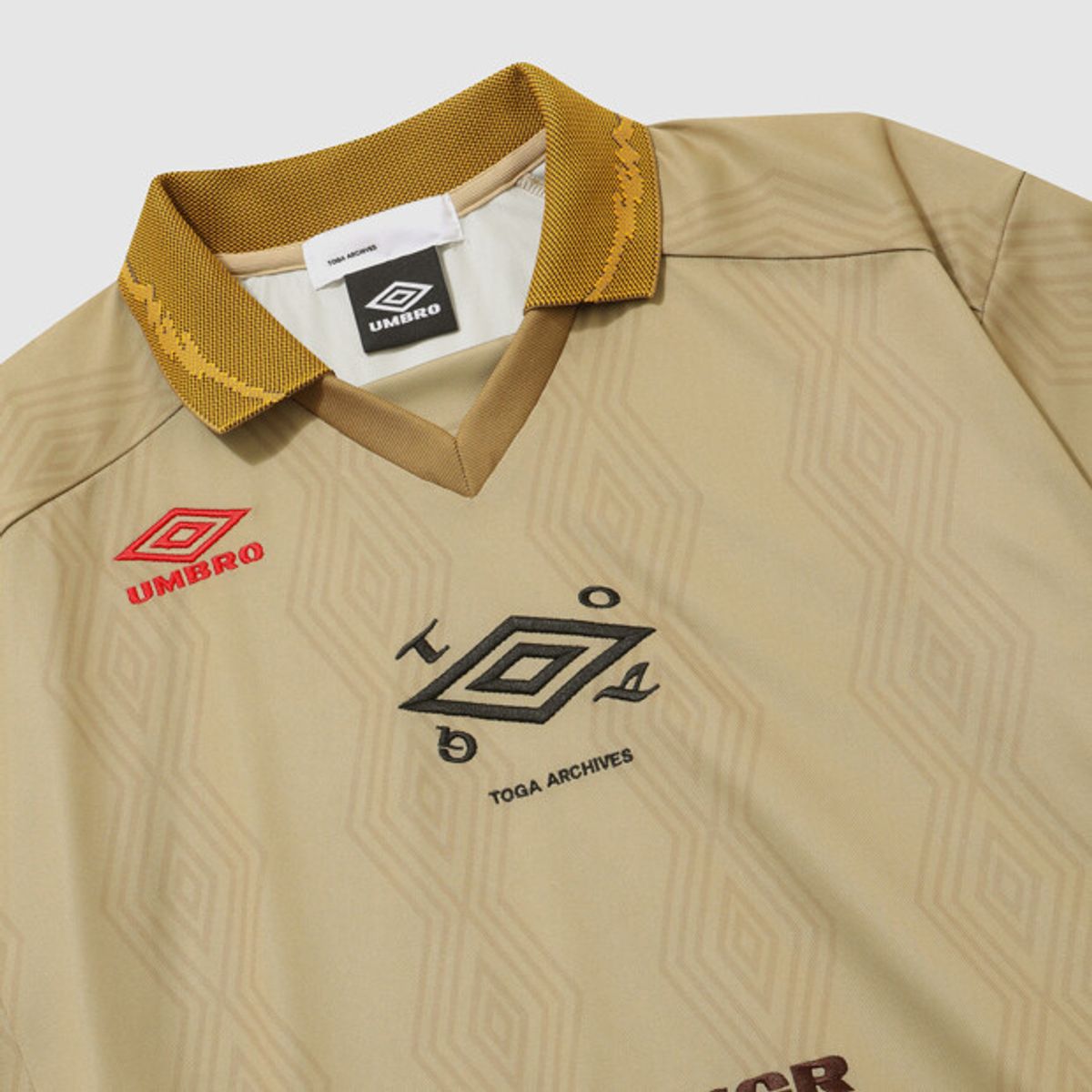 엄브로(UMBRO) [UMB X TOGA] 반팔 게임셔츠 원피스 베이지 UR112OOP21