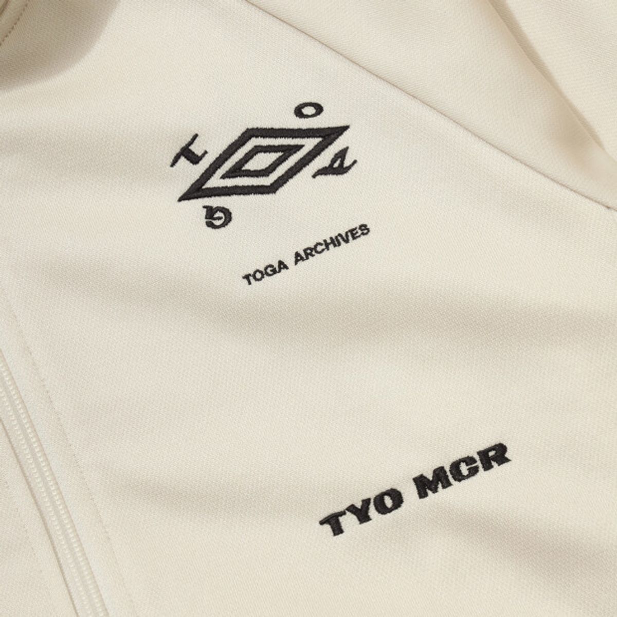 엄브로(UMBRO) [UMB X TOGA] 트랙 자켓 화이트 UR111OFT21