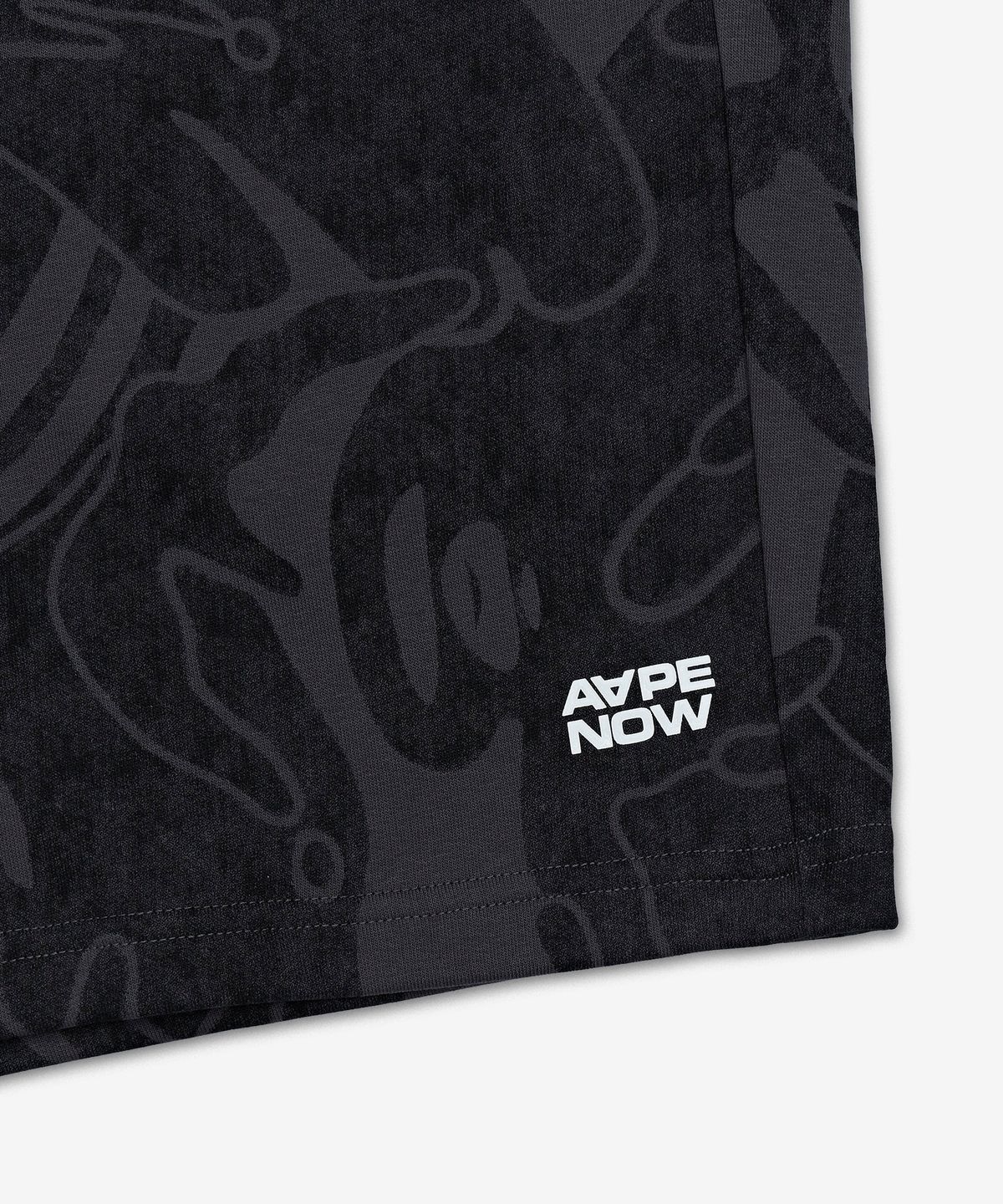 에이프(AAPE) 문페이스 스몰 로고 쇼츠 팬츠 - 카모 그레이 / AAPSPMC684XXQGYZ
