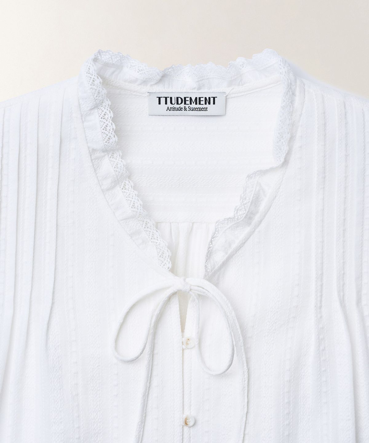 튜드먼트(TTUDEMENT) COTTON SLEEVELESS BLOUSE_OFF WHITE