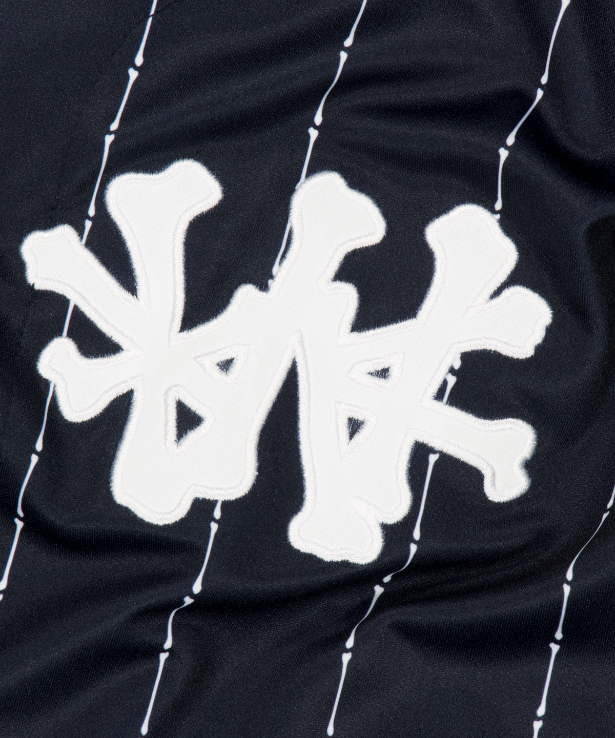 위캔더스(WKNDRS) BONE LEAGUE JERSEY (NAVY)