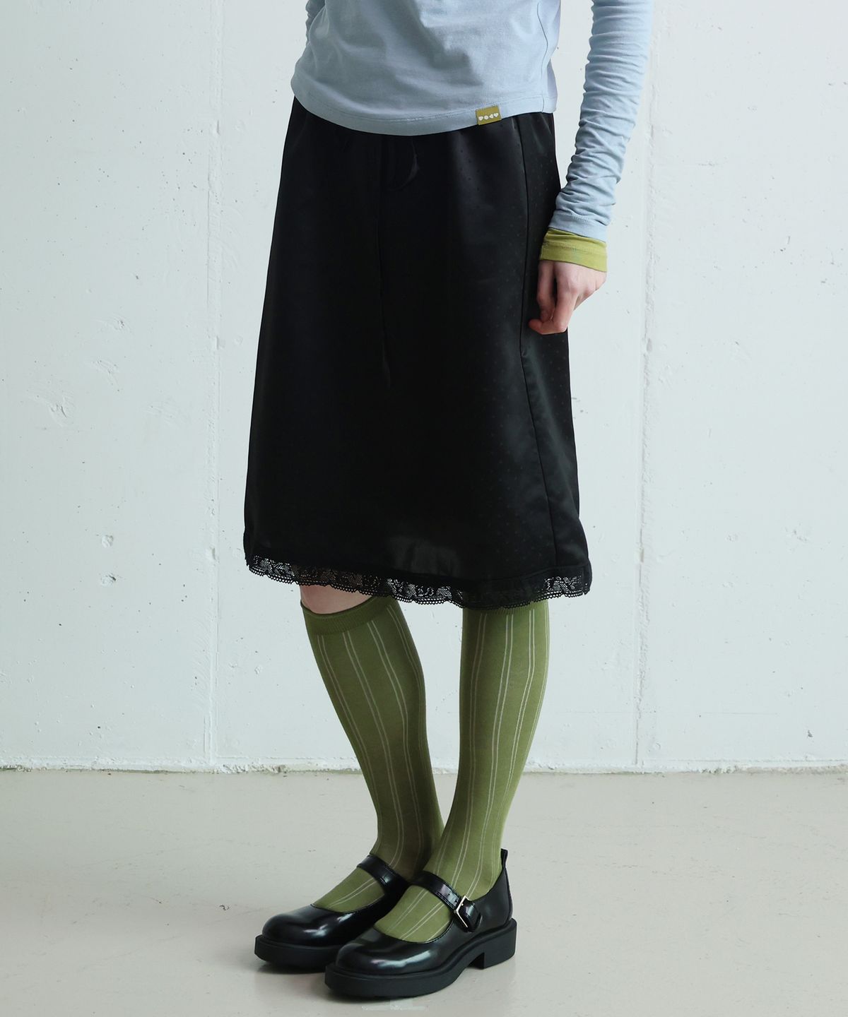 포에브(POEV) Dotted Drawstring Skirt - Black