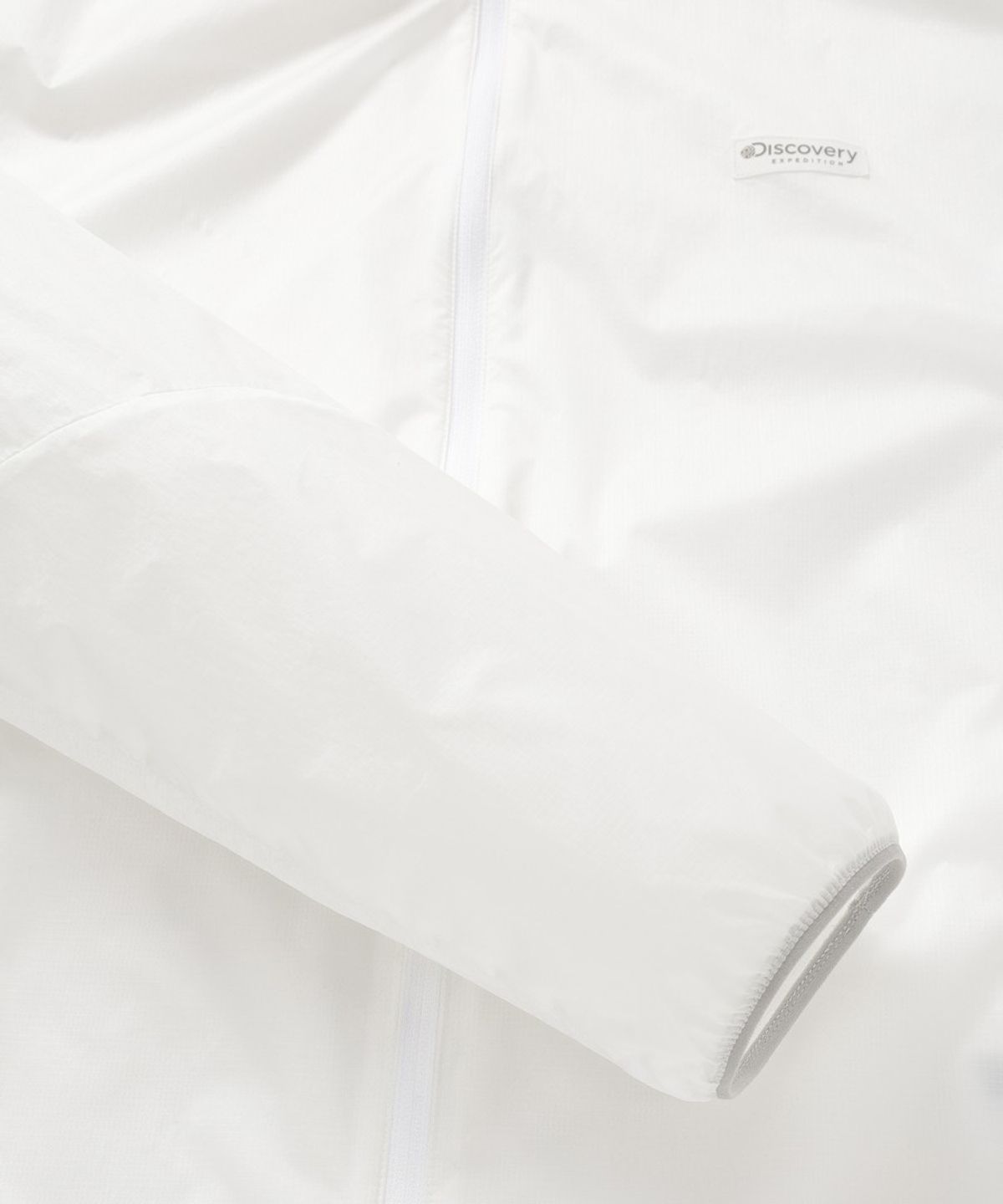 디스커버리 익스페디션(DISCOVERY EXPEDITION) 남성 초경량 바람막이 후드 자켓 (WHITE)