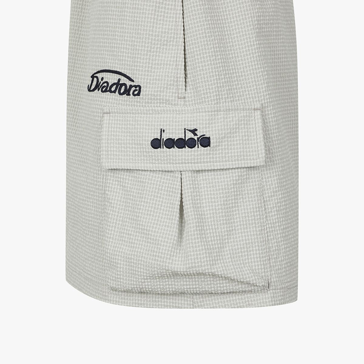디아도라(diadora) 에어서커 카고 스커트 BEIGE
