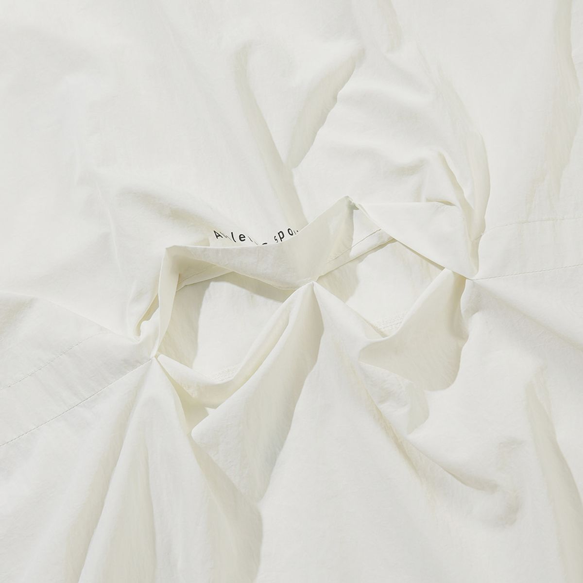 디아도라(diadora) 컴피 후드 반팔 아노락 IVORY
