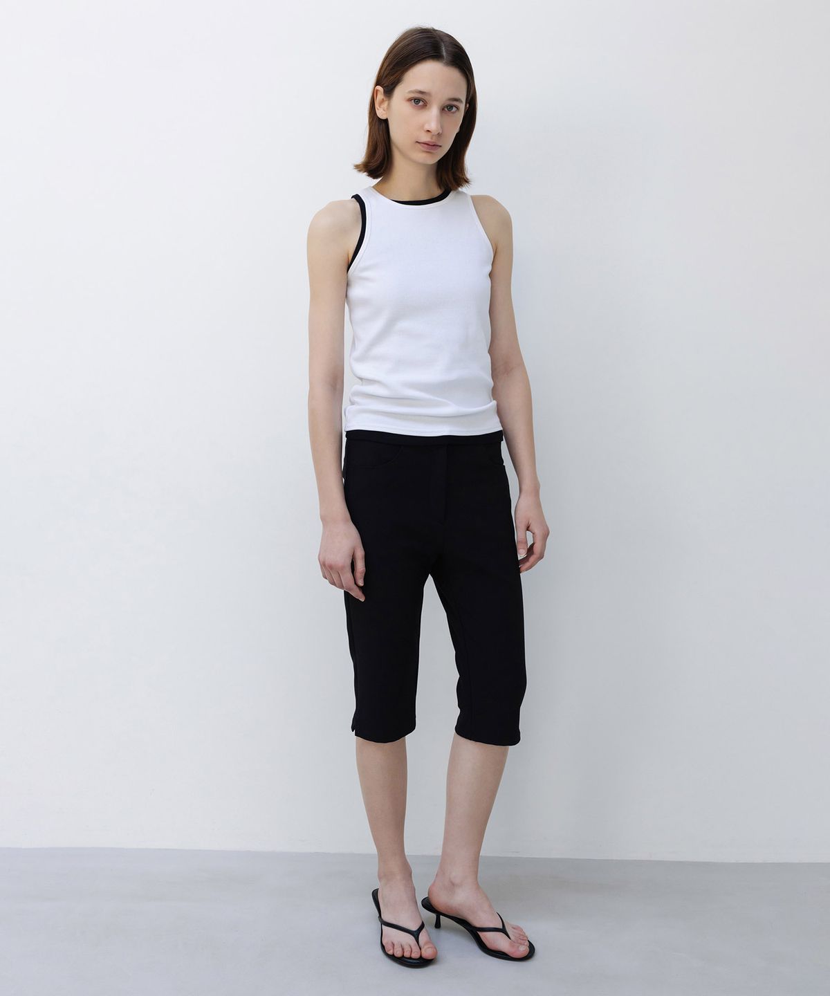 인사일런스 우먼(INSILENCE WOMEN) 워시드 립 홀터 슬리브리스 WHITE