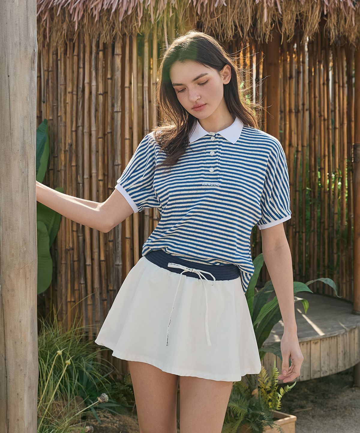 칸디니(KANDINI) 블루 스트라이프 래글런 폴로셔츠