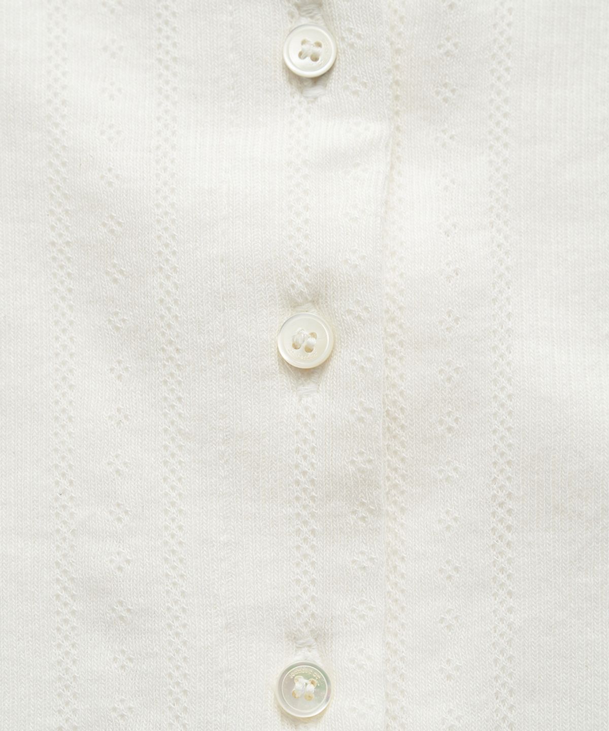 더바넷(THEBARNNET) Corin Button Sleeveless Top_Ivory