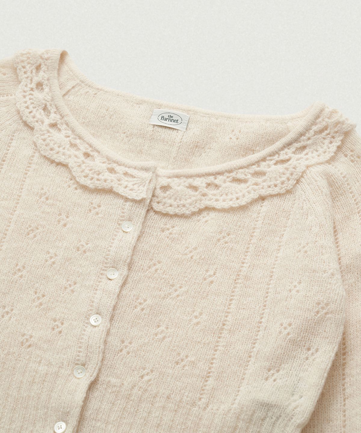 더바넷(THEBARNNET) Aveline Frill Knit Cardigan