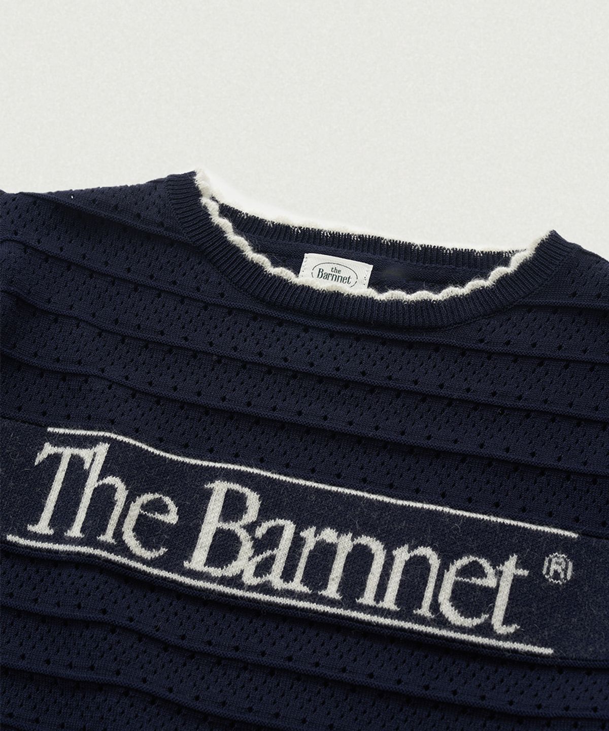 더바넷(THEBARNNET) Helen Logo Jacquard Knit Top_Navy