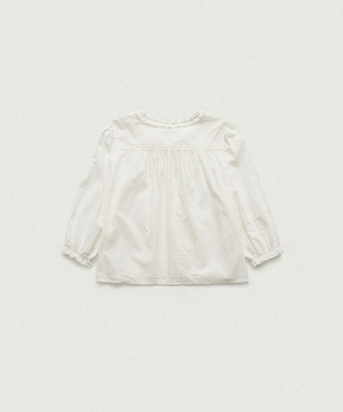 더바넷(THEBARNNET) Pevia Frill Pintuck Blouse