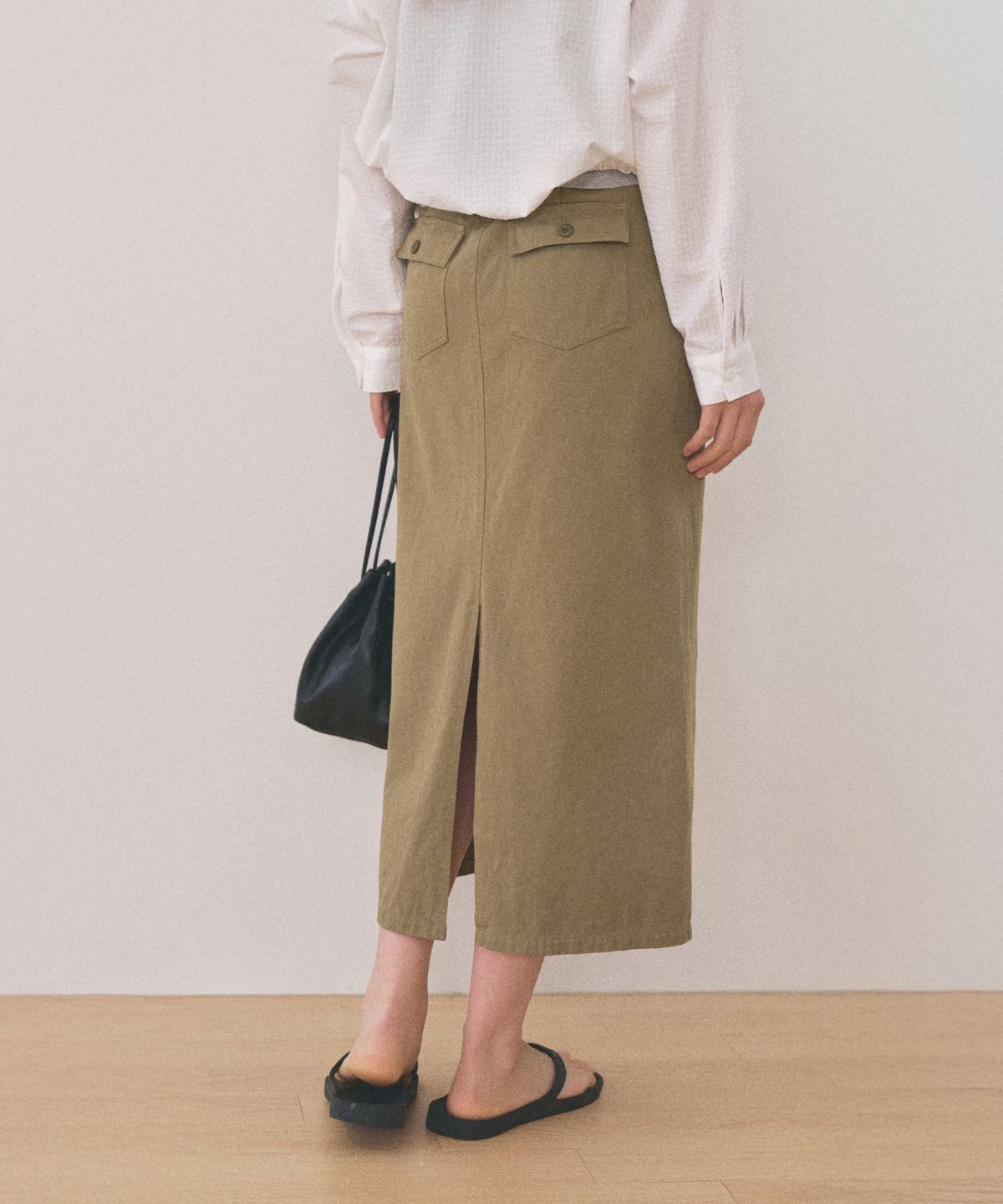 망고매니플리즈(MANGO MANY PLEASE) HEM WASHED SKIRT_KHAKI