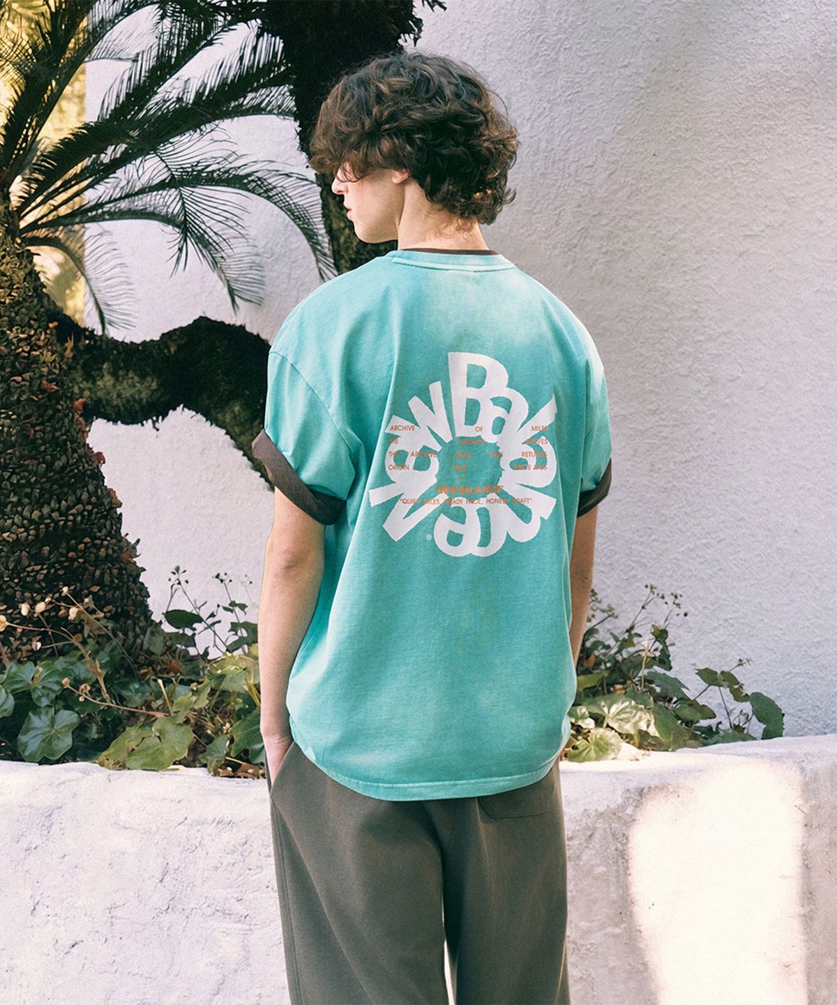 뉴발란스(NEW BALANCE) NBNEG2A083 / UNI Archive Pace Circle 반팔티 (TURQUOISE)