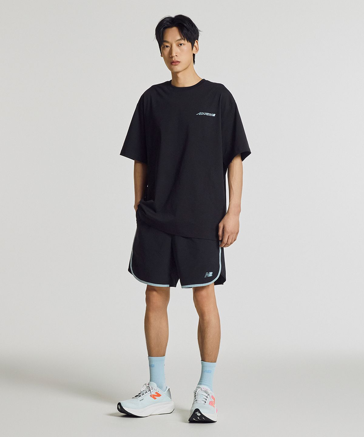 뉴발란스(NEW BALANCE) NBNEG21463 / UNI 살라고뛴다 픽토그램 반팔티 (BLACK)