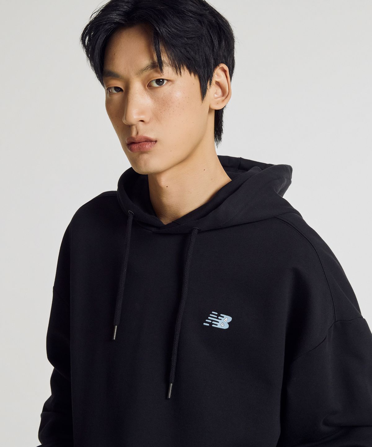 뉴발란스(NEW BALANCE) NBN0G21403 / UNI 살라고뛴다 픽토그램 후드티 (BLACK)