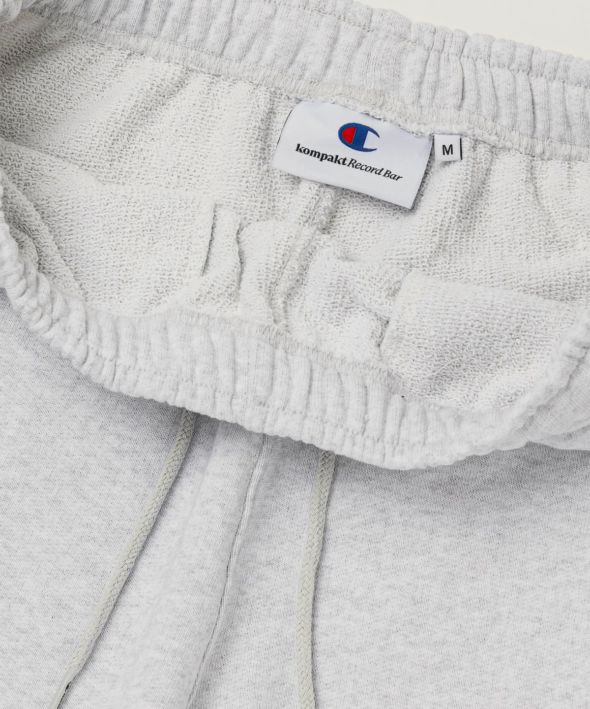 챔피온(CHAMPION) 챔피온 X 콤팩트레코드바 빅 로고 스웨트 팬츠 Light Grey