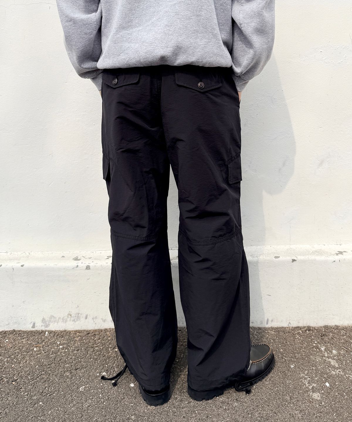 유니드가먼츠(YOUNEEDGARMENTS) 립스탑 서플러스 카고 팬츠 (블랙)