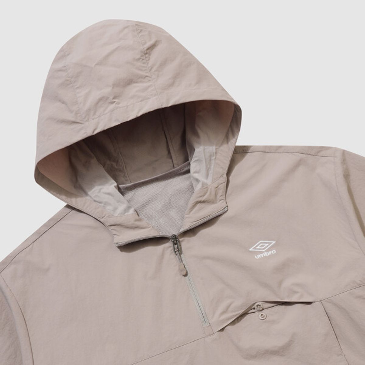 엄브로(UMBRO) 하이웨이 벤틸 후드 반팔 아노락 베이지 UR223CWT41