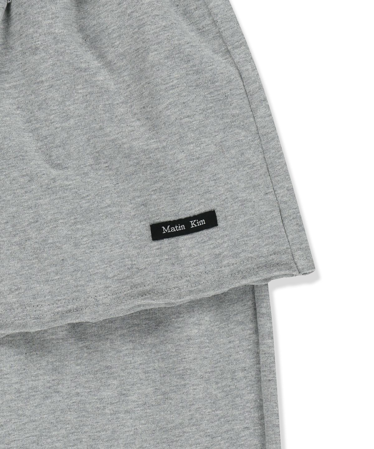 마뗑킴(MATIN KIM) LAYERED SKIRT JERSEY PANTS IN GREY