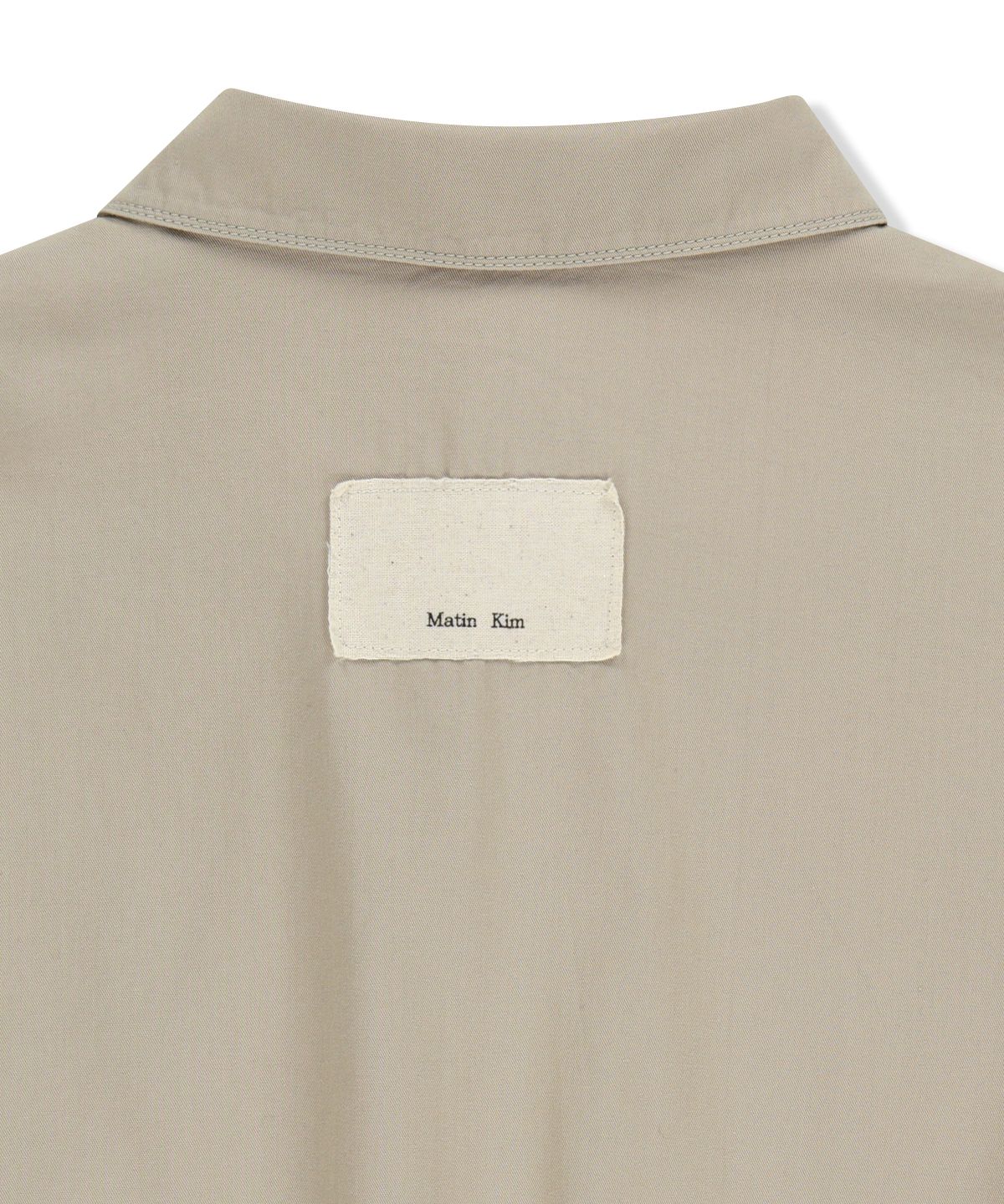 마뗑킴(MATIN KIM) SMALL LOGO COTTON ZIP UP JUMPER IN LIGHT BEIGE
