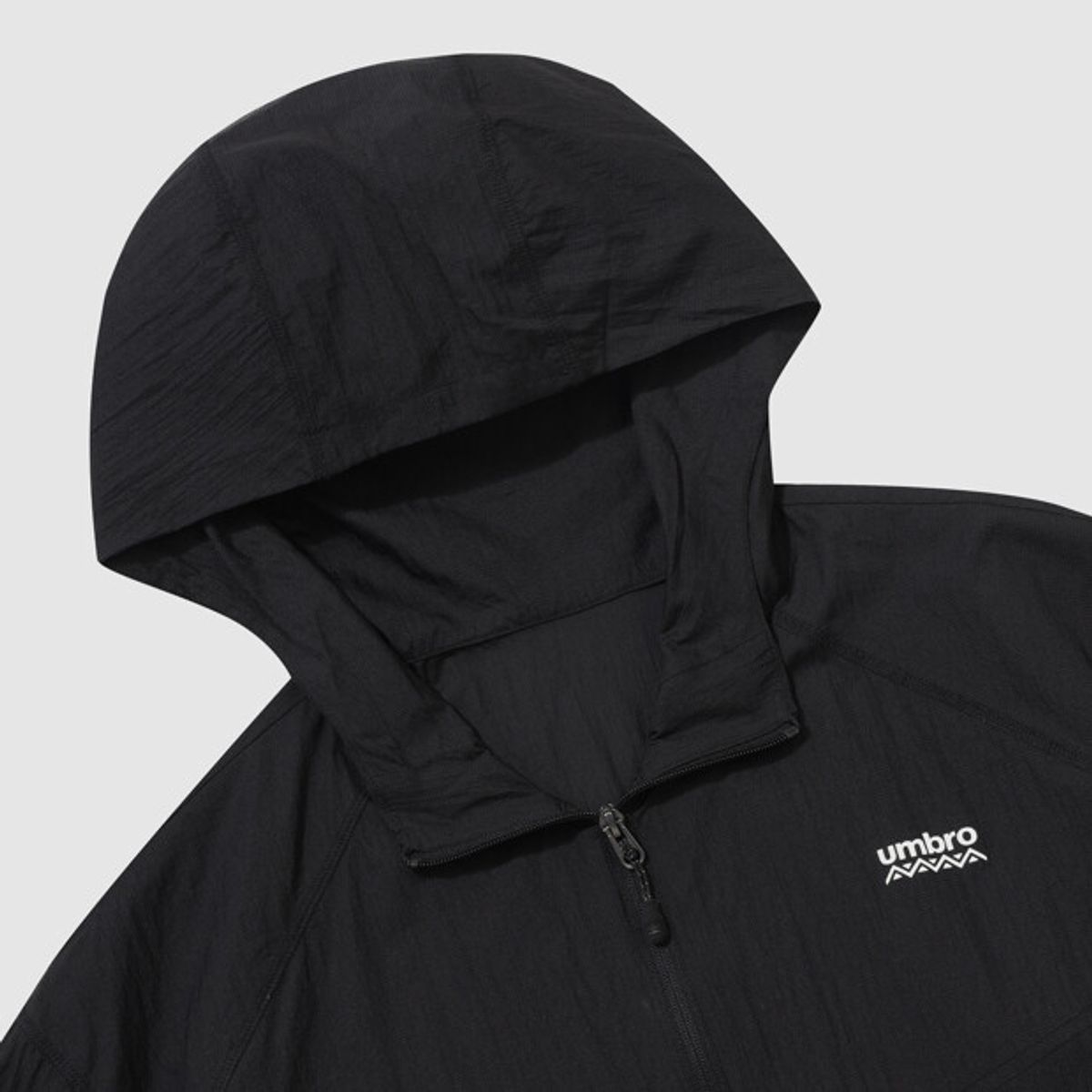 엄브로(UMBRO) 썬가드 초경량 후드 바람막이 자켓 블랙 UR221CJK43