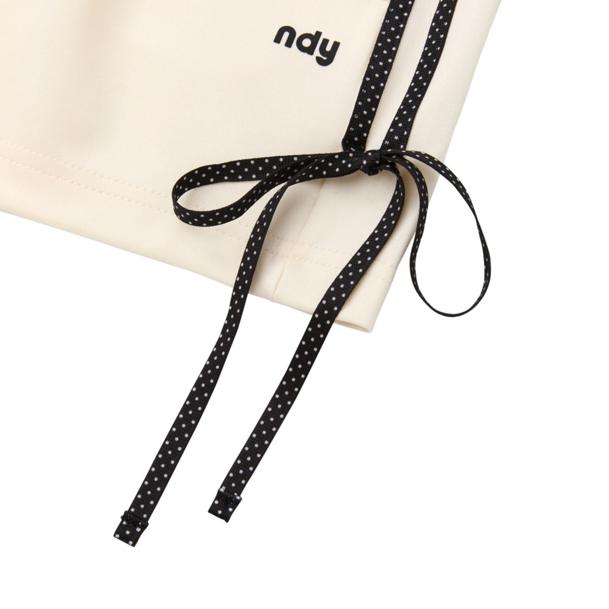 엔디와이(NDY) 도트 리본 트랙 쇼츠 크림
