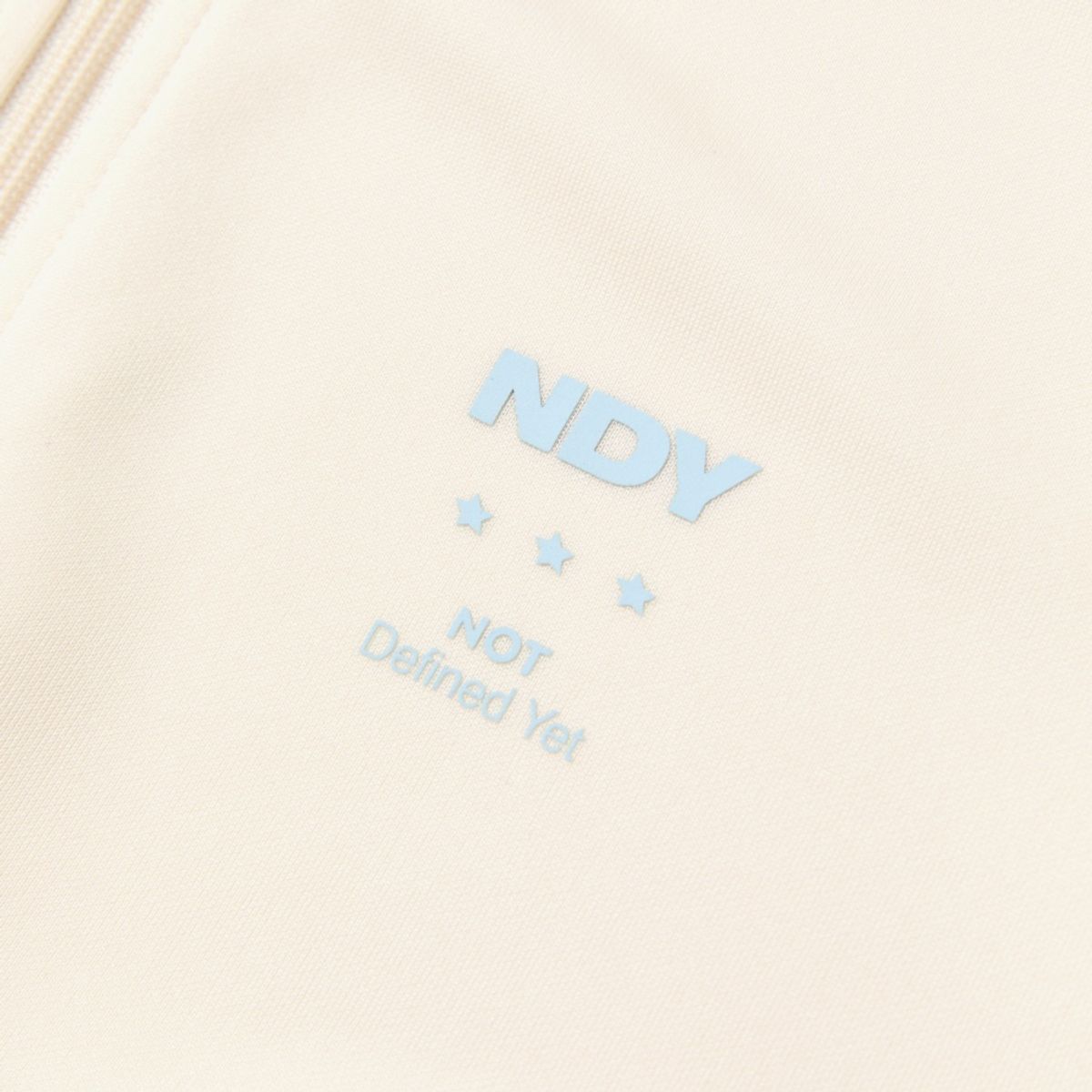 엔디와이(NDY) 스포티 NY 반팔 트랙 탑 크림