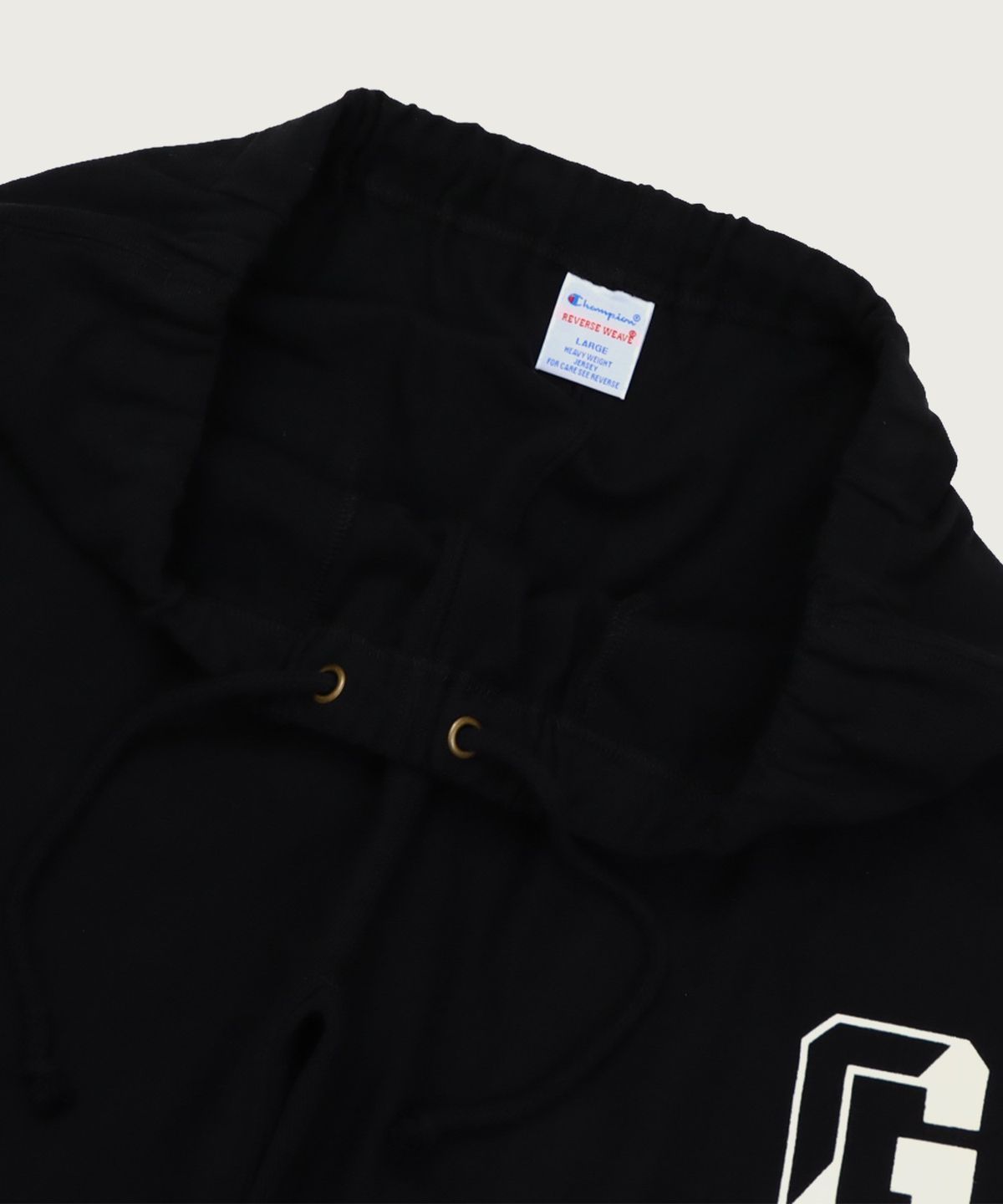 챔피온(CHAMPION) 리버스위브 그래픽 스웨트 쇼츠 Black