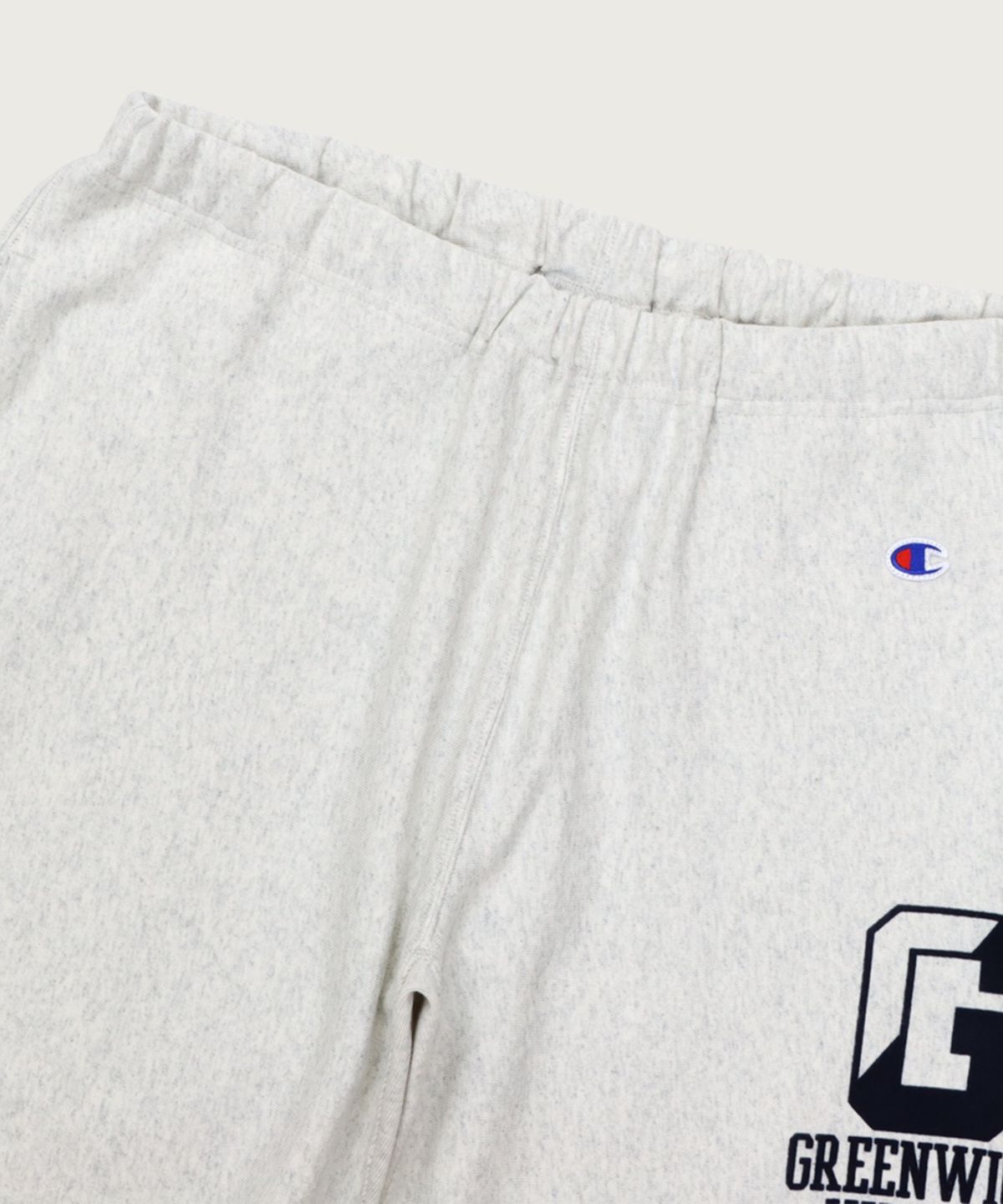 챔피온(CHAMPION) 리버스위브 그래픽 스웨트 쇼츠 Oatmeal