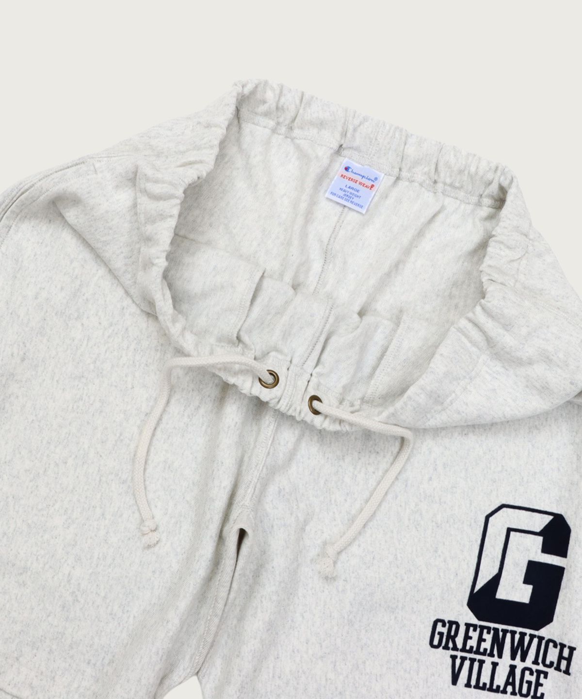 챔피온(CHAMPION) 리버스위브 그래픽 스웨트 쇼츠 Oatmeal