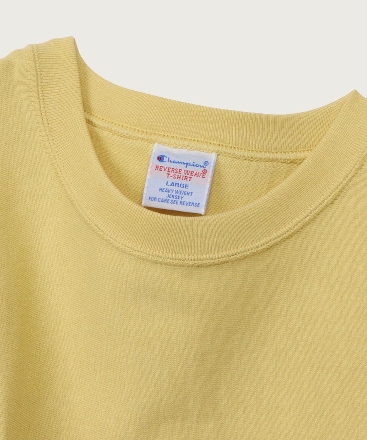 챔피온(CHAMPION) 리버스위브 루즈핏 포켓 반팔 티셔츠 Yellow