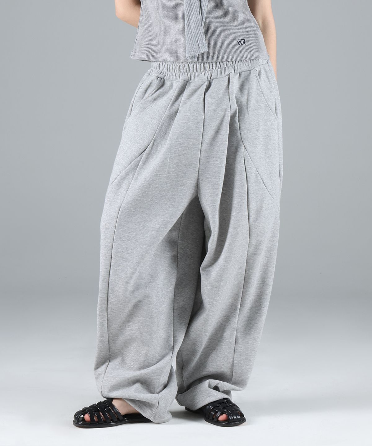 포더핏(FOR THE FIT) 절개 커브드 와이드 스웨트팬츠_멜란지