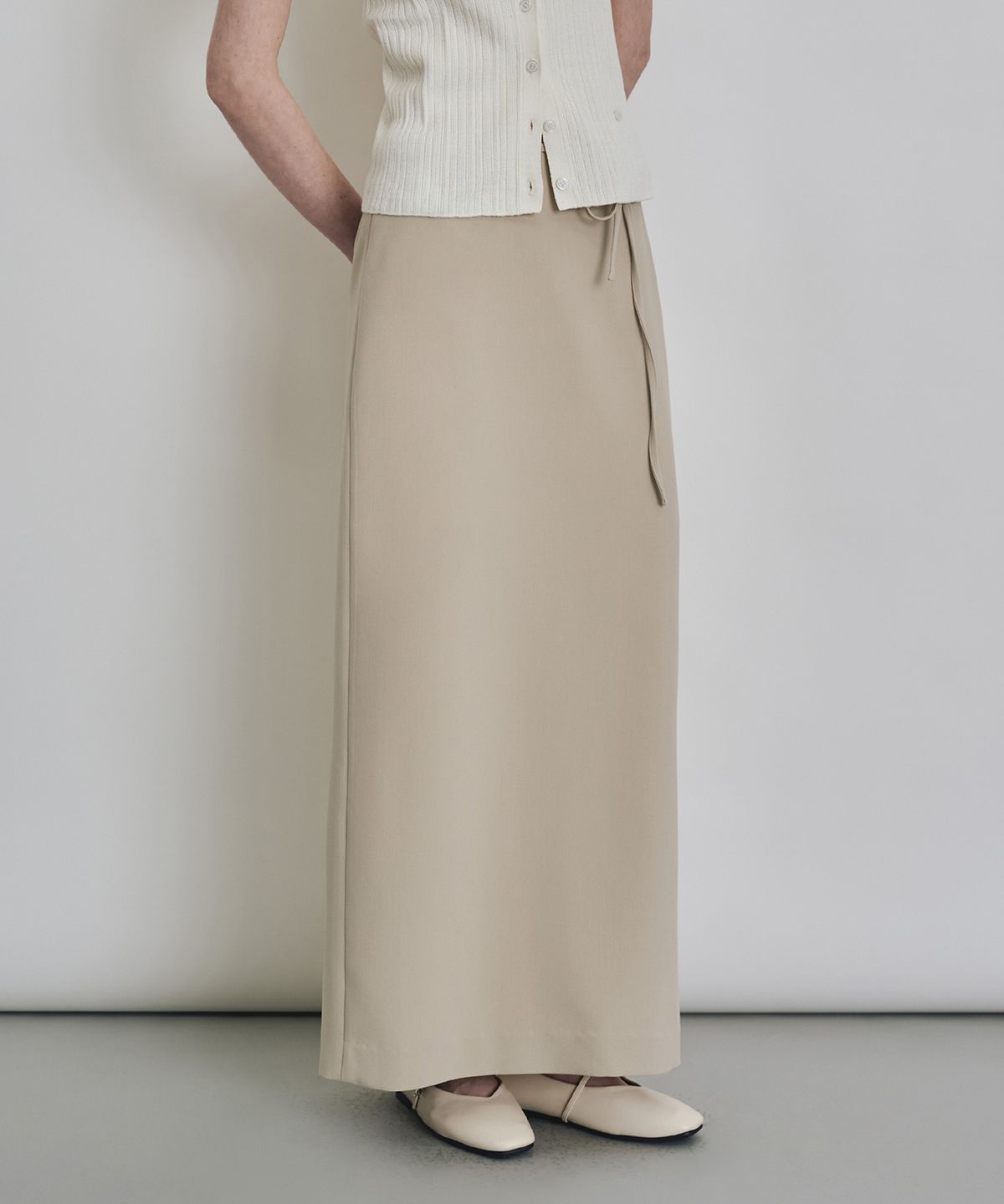 커스텀어클락 우먼(COSTUMEOCLOCK WOMAN) 포멀 슬릿 H라인 맥시 스커트 베이지 COWSK002BEIGE