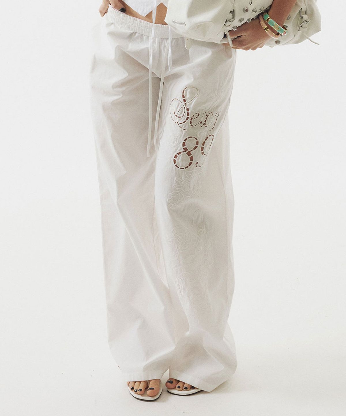 스컬프터(SCULPTOR) Eyelet Embroidery Pants White