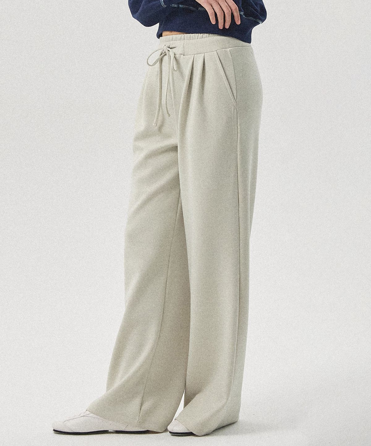 아흐레(AHRE) Maro Two-Tuck Wide Jersey Pants_BEIGE