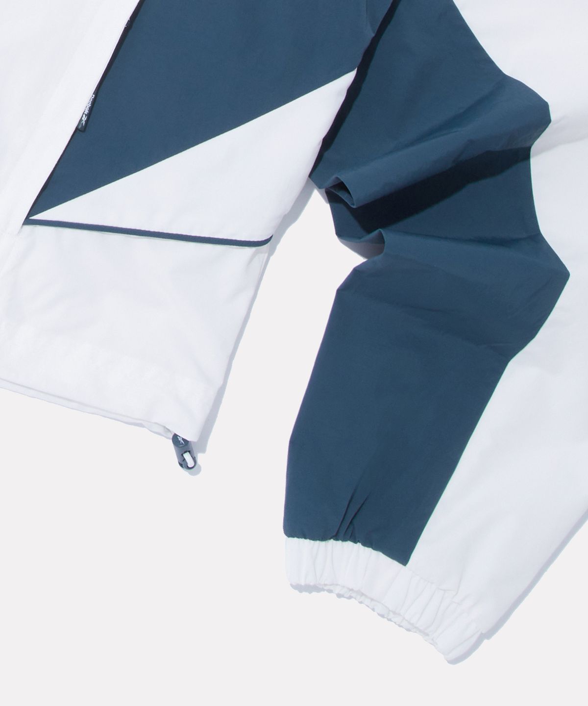 리복(REEBOK) 일립스 크롭 윈드브레이커 v26 (W) - 아이보리:틸 그린