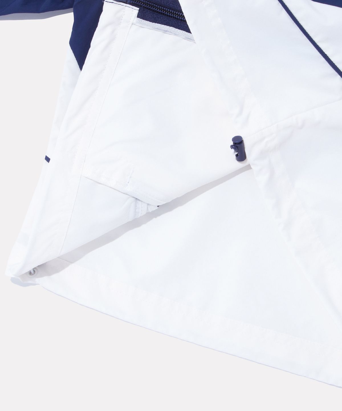 리복(REEBOK) 일립스 크롭 윈드브레이커 v26 (W) - 화이트:네이비