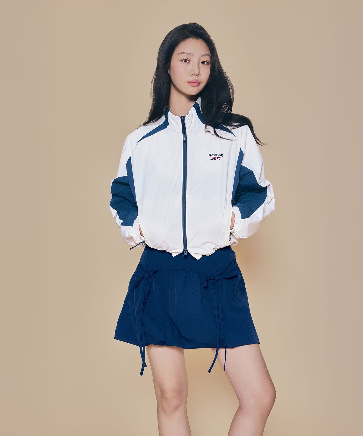리복(REEBOK) 벌룬 셔링 미니 스커트 (W) - 네이비