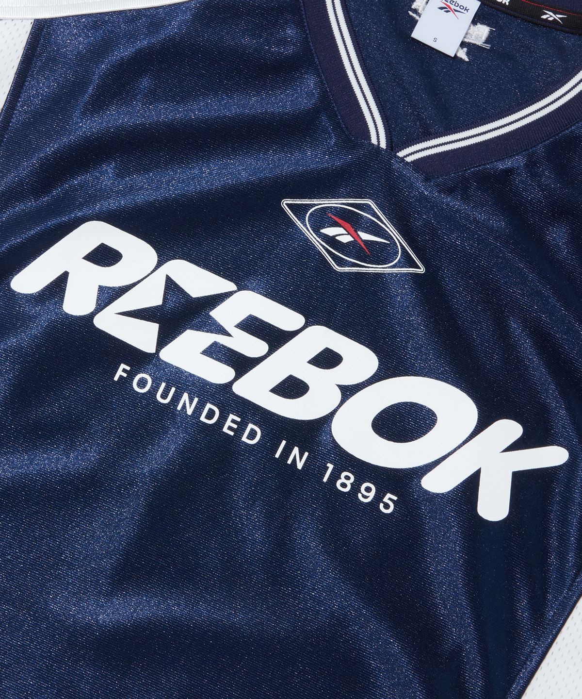리복(REEBOK) 스포츠 저지 새틴 반팔티 (W) - 네이비