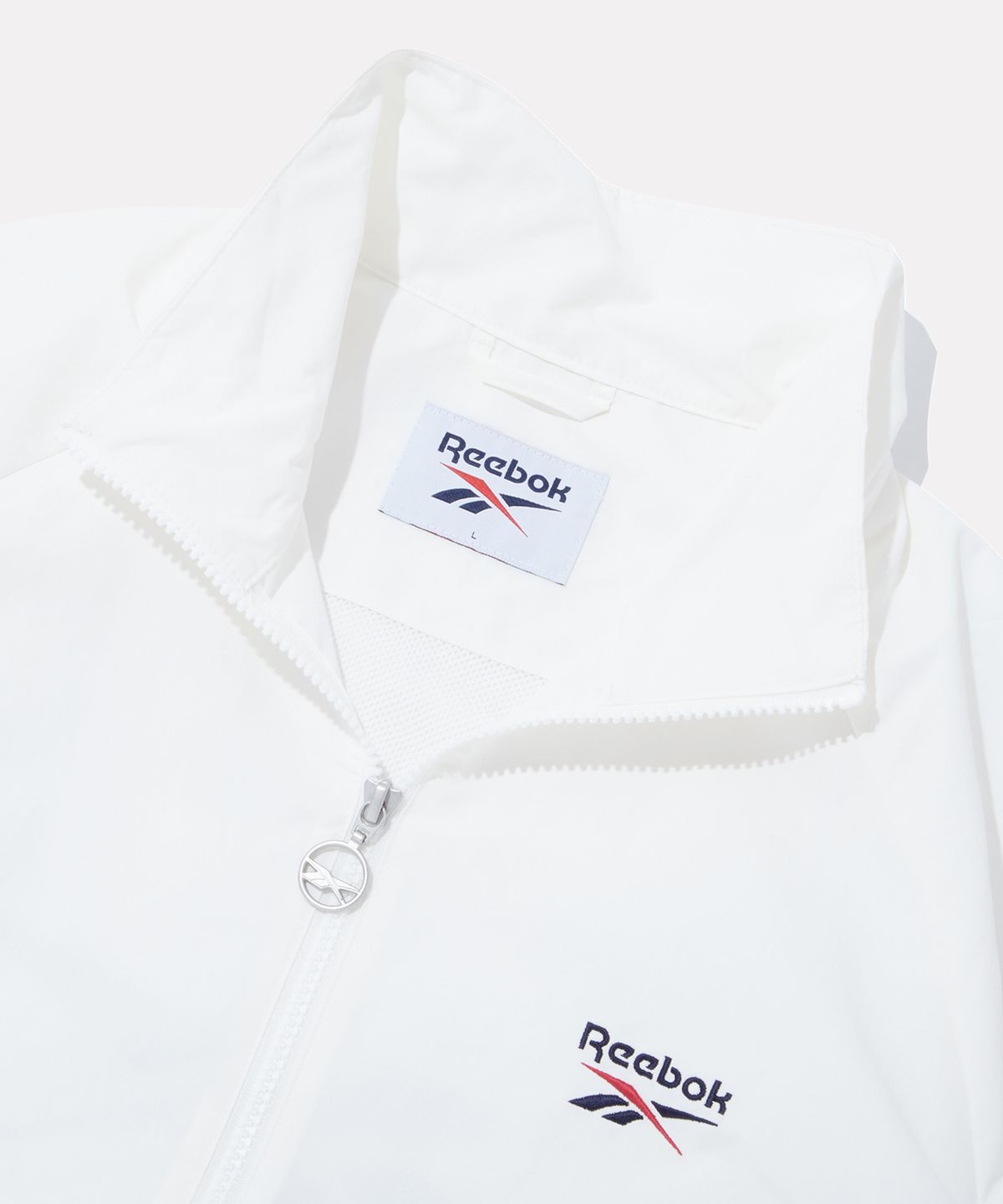 리복(REEBOK) DNA 컬러블록 윈드브레이커 - 오프 화이트
