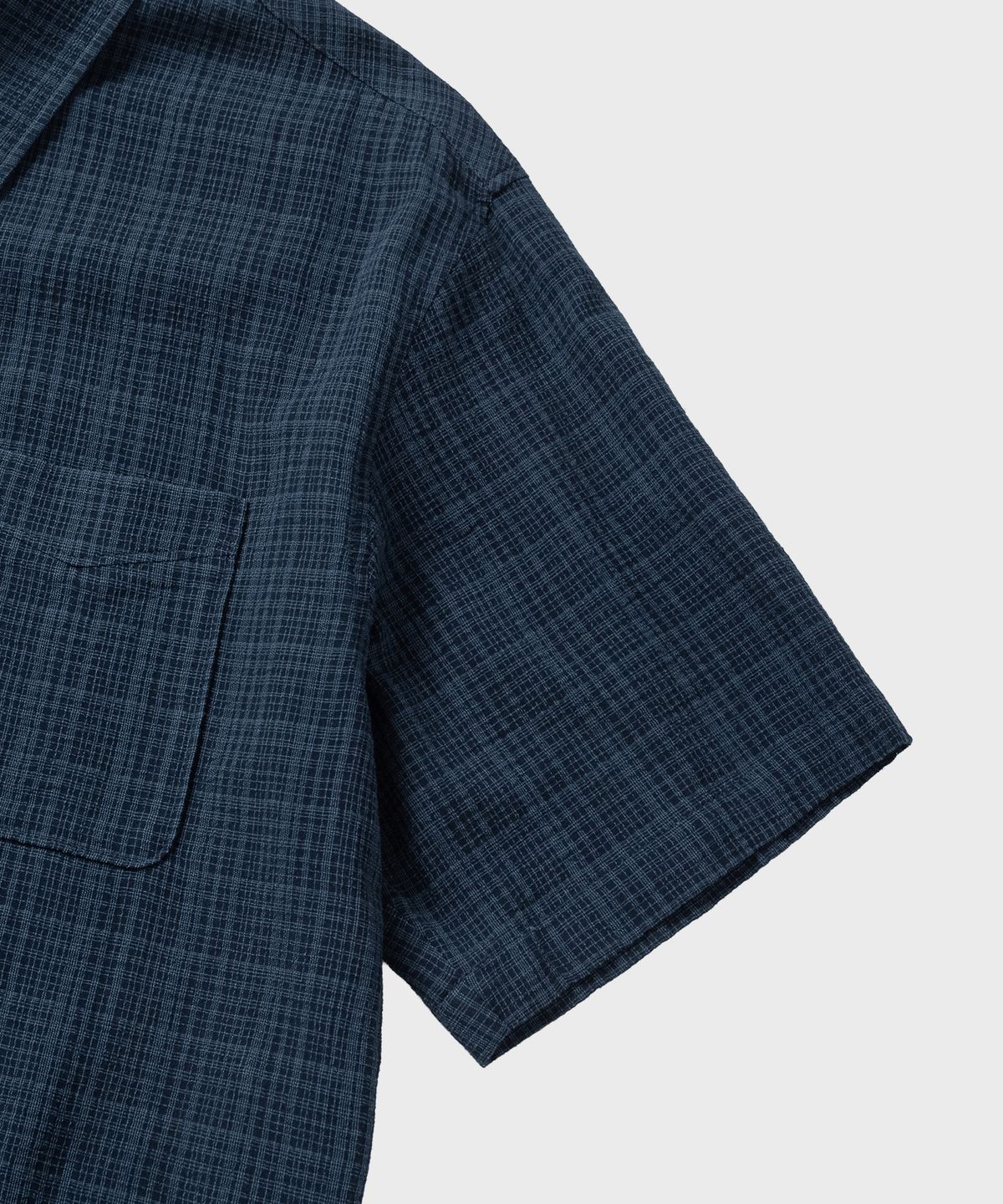 넌블랭크(NONBLANK) 일레귤러 윈도우 체크 크롭 HS 셔츠_DARK BLUE