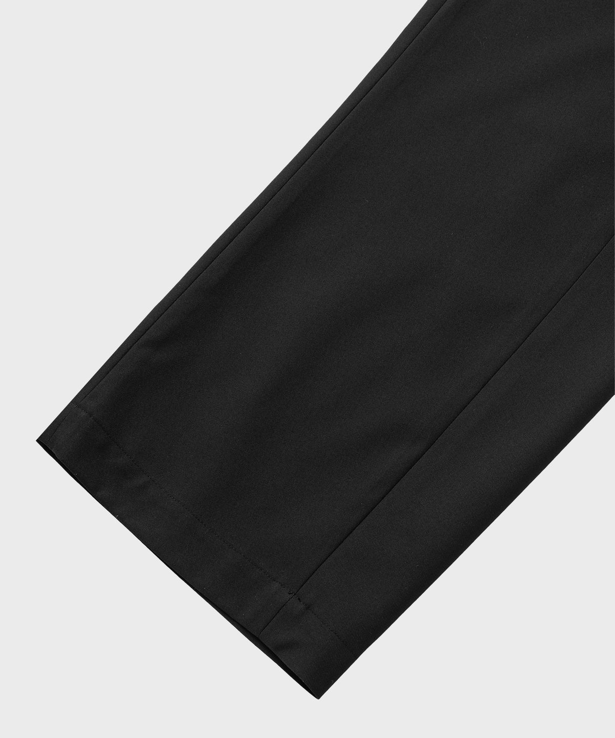 넌블랭크(NONBLANK) 커브드 루즈핏 밴딩 슬랙스_BLACK